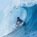 Utilice este título Su pasión por el surf la llevó a los 12 años a ser la más joven en una competencia mundial y entró al Libro Guinness de los récords y cree en base a ese titulo original un titulo nuevo, preciso, comprensible y que no pierda relacion con el titulo original. Necesito que me devuelvas solo y nada mas que el titulo nuevo.
